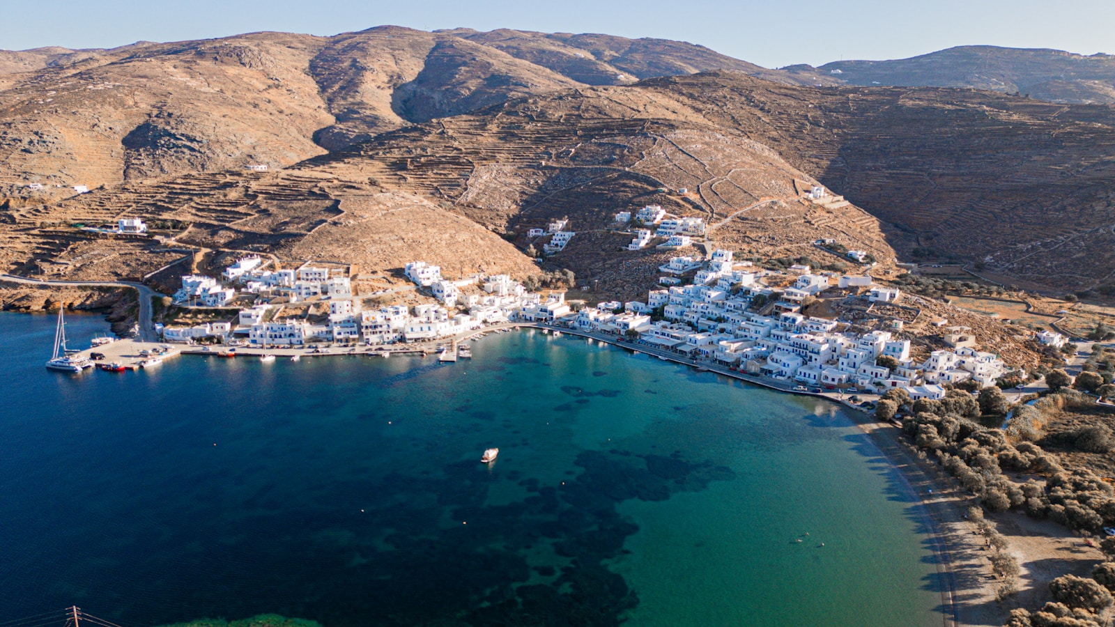 A large body of water surrounded by mountains